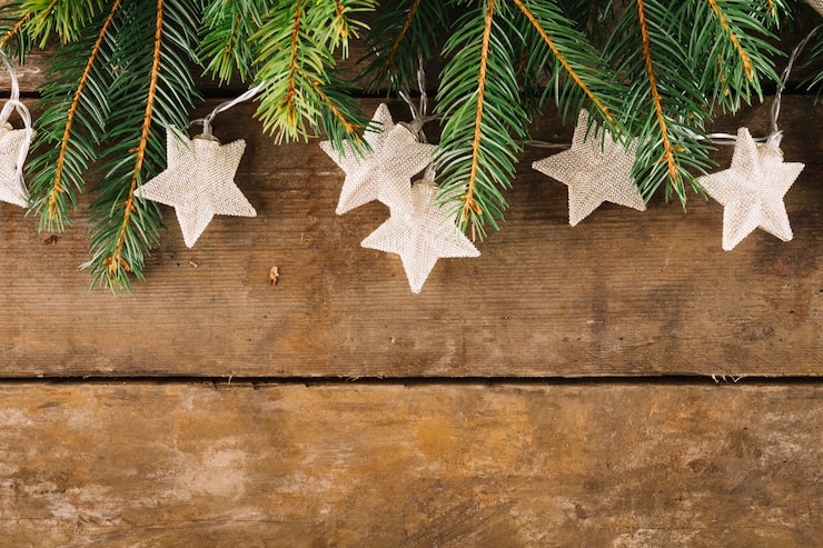 Free Photo christmas composition with stars and fir