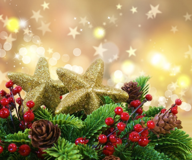 Free Photo christmas decorations on gold starry background