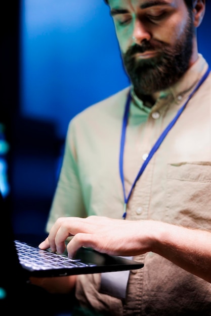 Free Photo engineer maintenancing server rigs to optimize them for data processing requirements of ai workloads worker inspecting neural network high tech facility used for machine learning