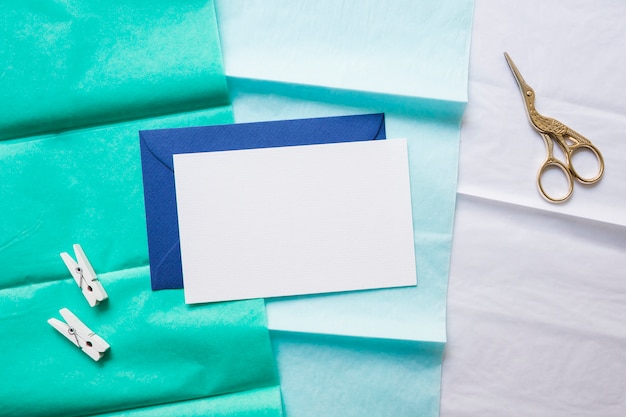 Free Photo envelope and scissors on gradient paper line 