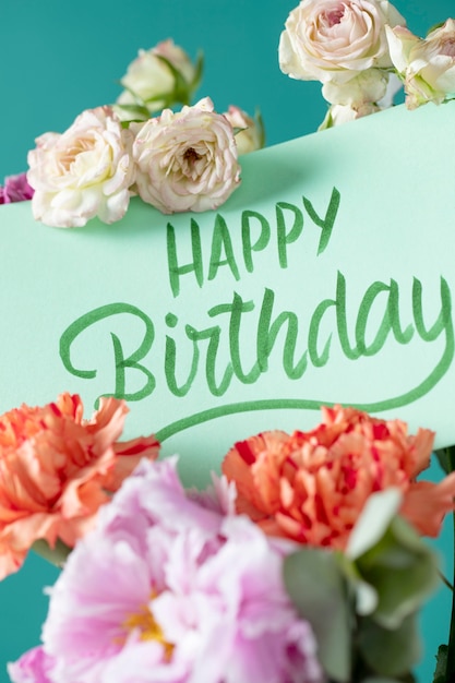 Free Photo happy birthday card with flowers assortment