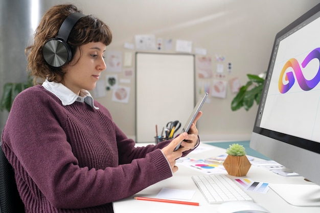 Free Photo logo designer working on a computer desktop