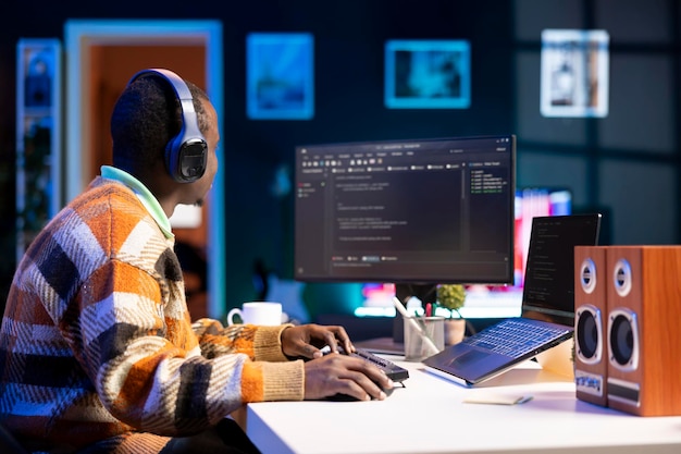 Free Photo male programmer working on developing new html script