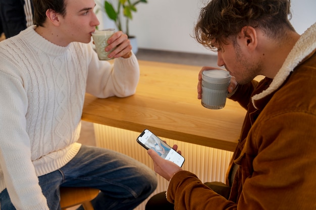 Free Photo man drinking matcha tea