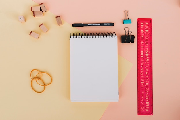 Free Photo notebook and drafting supplies composition