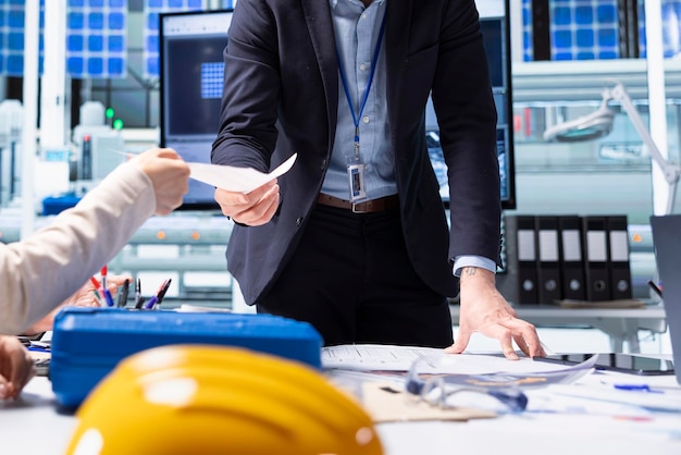 Free Photo shareholders reading report of research and development data