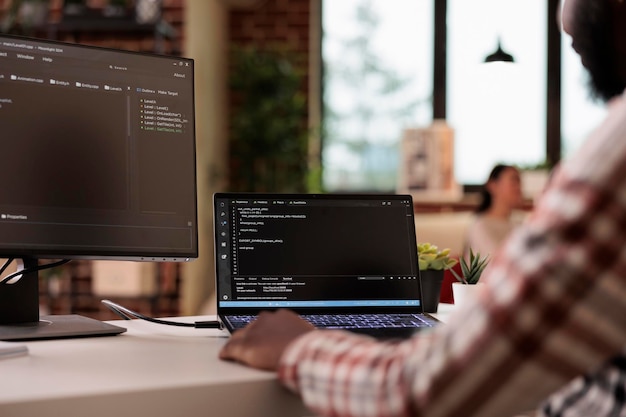 Free Photo software developer programming firewall security on multiple monitors, learning new user interface. developing application cloud server with binary code and html script on terminal window.