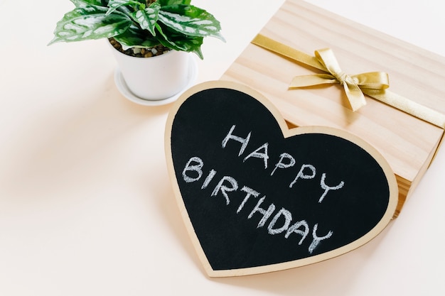 Free Photo wooden box with tiny chalkboard