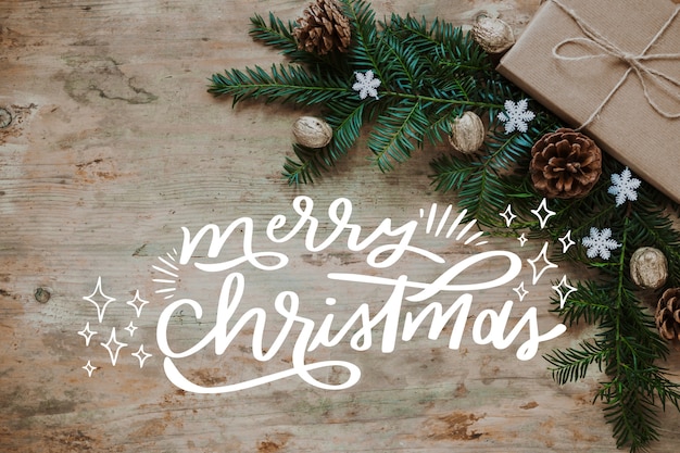 Free Vector christmas photo with lettering and branches
