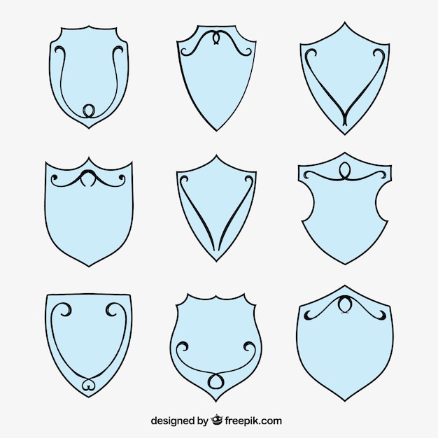 Free Vector ornamental set of hand drawn heraldic shields
