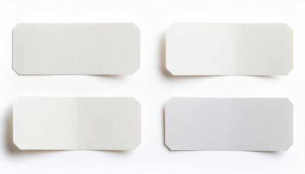 Photo blank white labels textured paper tags four empty rectangular tags
