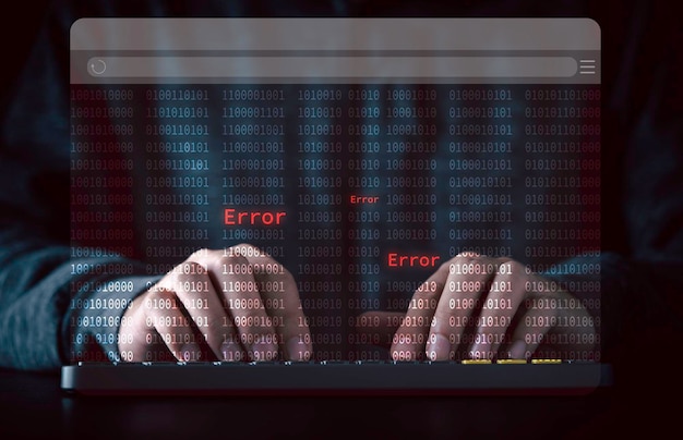 Photo businessman typing on computer keyboard with virtual monitor red error wording among binary code for notification error maintenance and mistake writing software code concept