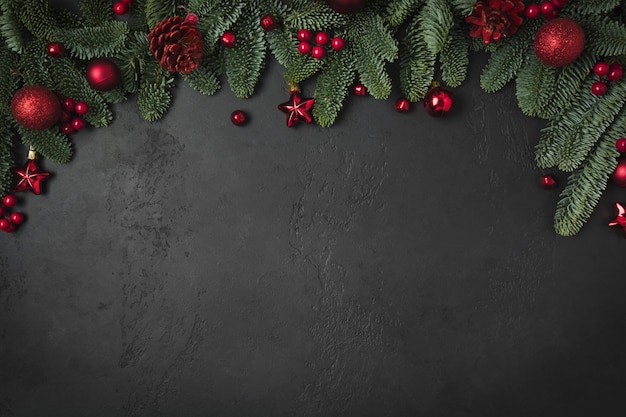Photo christmas winter arch with fir branches and red balls
