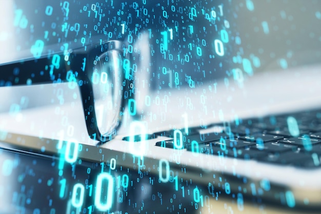 Photo close up of laptop glasses and cellphone with creative binary coding on blurry background matrix and security concept double exposure