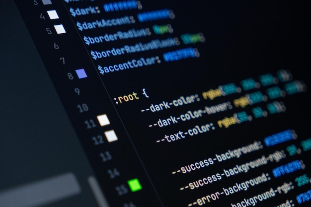 Photo closeup of computer screen with colorful css code focus on root selector web development frontend design and programming