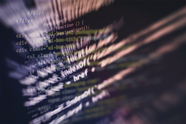 Photo closeup developing programming and coding technologies. developer working on web sites codes in office.