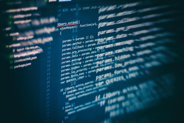 Photo closeup developing programming and coding technologies. developer working on web sites codes in office.