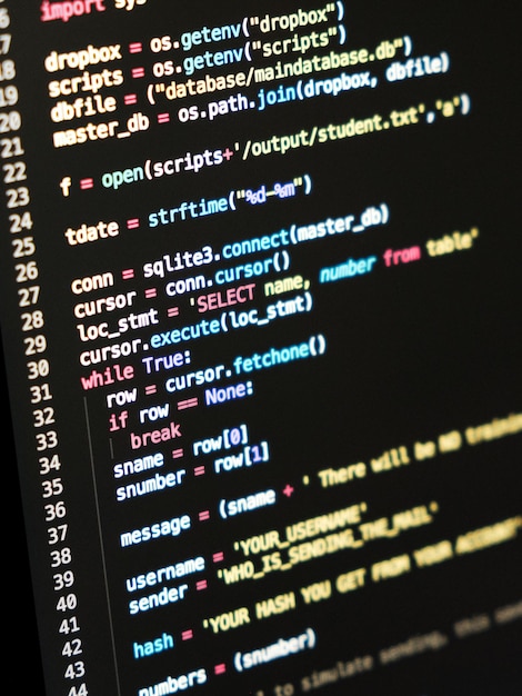 Photo coding programmer abstract background computer language script code on screen