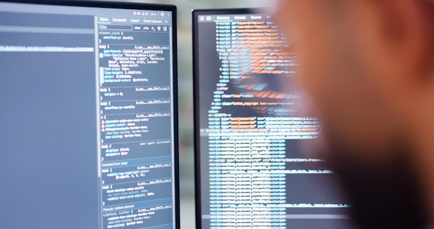 Photo computer screen programming and web development with person in office for coding script cybersecurity data and software code with programmer in workplace for mainframe network or online design