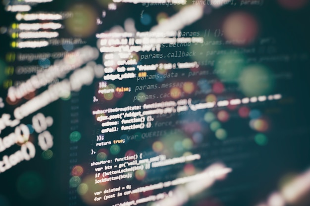 Photo css, javascript and html usage. monitor closeup of function source code. abstract it technology background. software source code.