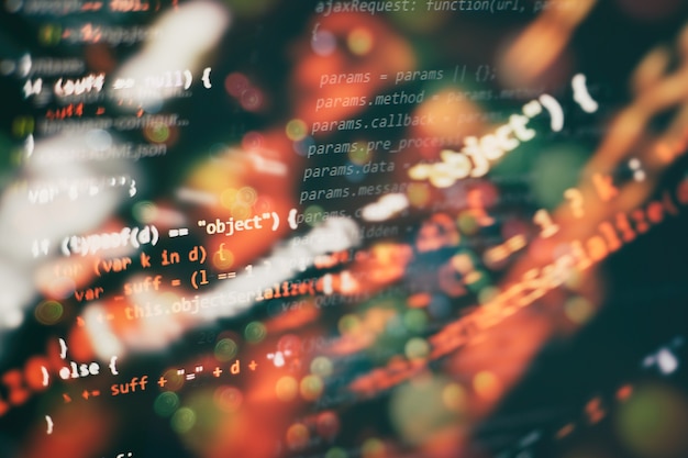 Photo css, javascript and html usage. monitor closeup of function source code. abstract it technology background. software source code.