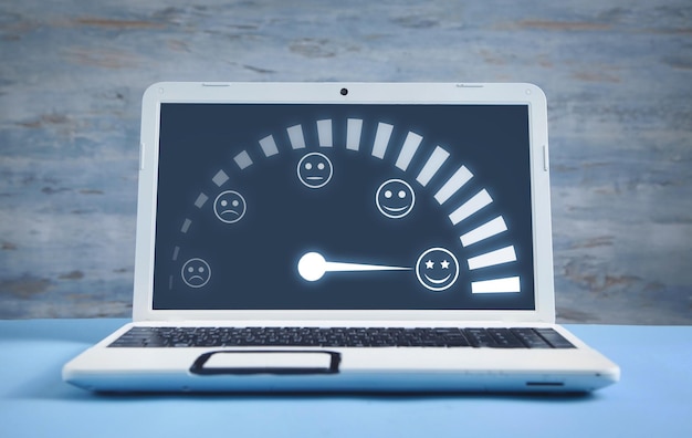 Photo customer emotions satisfaction meter on computer screen