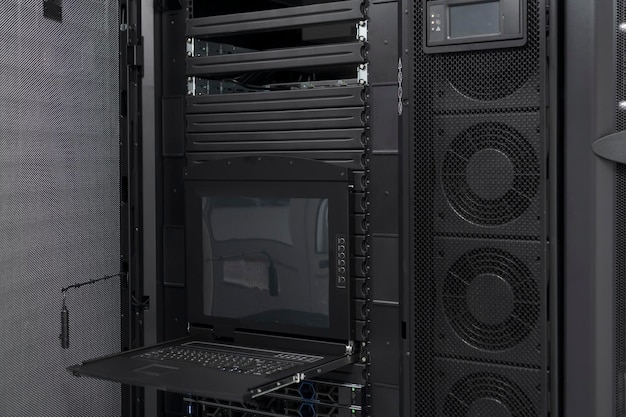 Photo data center with multiple rows of fully operational server racks. modern telecommunications, cloud computing, artificial intelligence, database, supercomputer technology concept. high quality photo