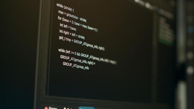 Photo database cloud computing with programming code on computer, html script it language on terminal window. firewall security server with artificial intelligence for app developing. close up.