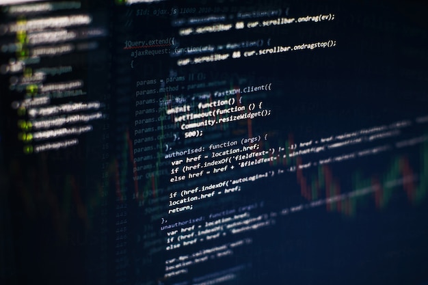 Photo developer programming code. abstract computer script code. programming code screen of software developer. software programming work time.