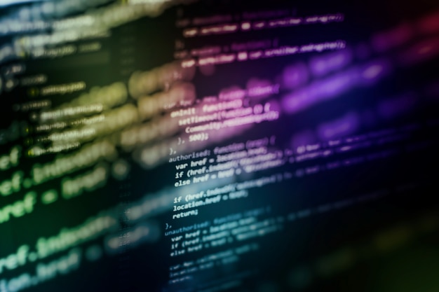 Photo developer programming code. abstract computer script code. programming code screen of software developer. software programming work time.