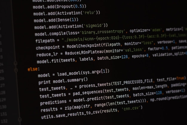 Photo developer python, java script, html, css source code on monitor screen. writing script of software developer. program coding. programmer editing code background. technology background close up shot.