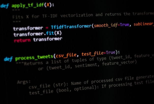 Photo developer python, java script, html, css source code on monitor screen. writing script of software developer. program coding. programmer editing code background. technology background close up shot.