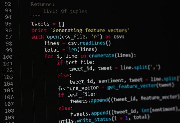 Photo developer python, java script, html, css source code on monitor screen. writing script of software developer. program coding. programmer editing code background. technology background close up shot.