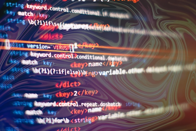 Photo digital technology on display. html5 in editor for website development. website html code on the laptop display closeup photo.