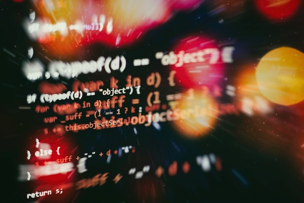 Photo digital technology on display. html5 in editor for website development. website html code on the laptop display closeup photo.