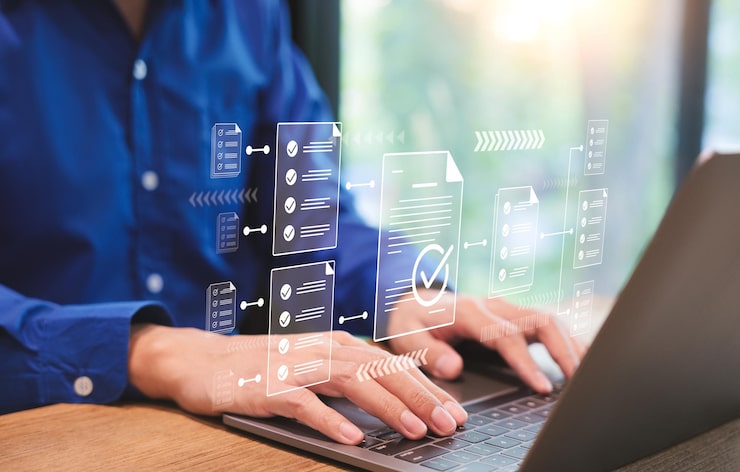 Digital workflow automation Businessman using laptop computer doing online checklist survey Document management checking system online documentation database and process manage files Checkmark