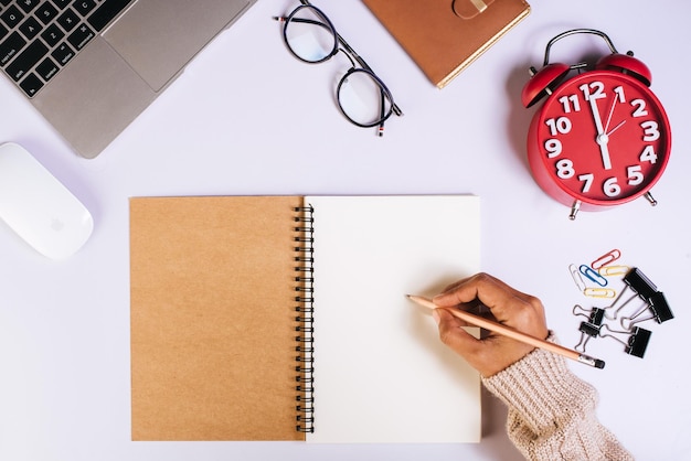 Photo directly above shot of clock on table