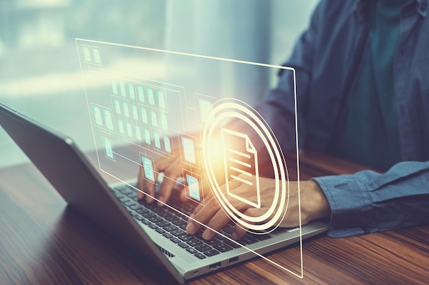 Photo document management concept businessman using computer to document management concept online documentation database and digital file storage system or software records keeping database technology