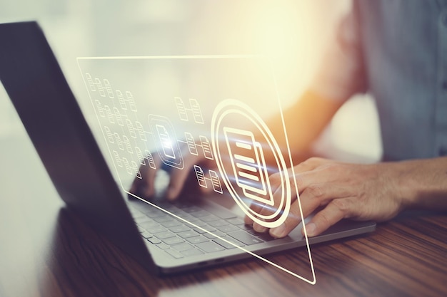 Photo document management concept businessman using computer to document management concept online documentation database and digital file storage system or software records keeping database technology