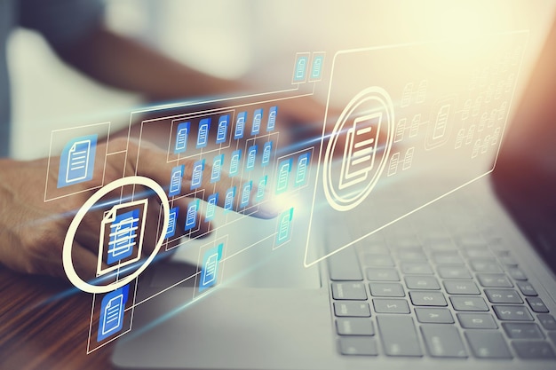 Photo document management concept businessman using computer to document management concept online documentation database and digital file storage system or software records keeping database technology