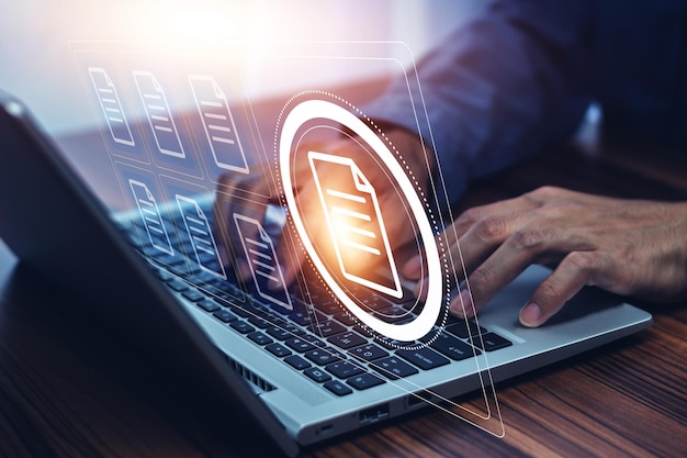 Photo document management concept businessman using computer to document management concept online documentation database and digital file storage system or software records keeping database technology