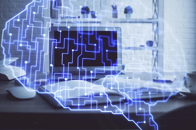 Photo double exposure of table with computer and brain hologram data innovation concept