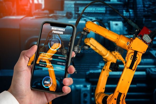 Photo engineer controls robotic arms by augmented reality industry technology