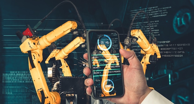 Photo engineer controls robotic arms by augmented reality industry technology