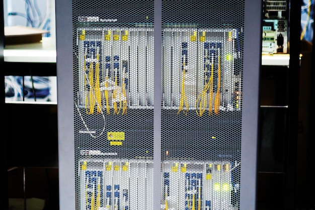 Photo fiber optic with servers in a technology data center