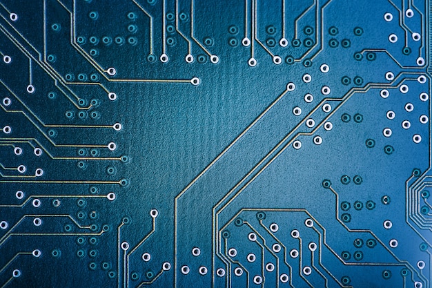 Photo high tech circuit board. macro technology and computing concept. network technology background .