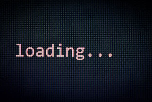 Photo loading message on display screen black background data progress loading complete alert computer network system software concept