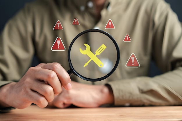 Photo maintenance fixing system warning on internet or caution sign symbol notification error cyber attack on computer network cybersecurity vulnerability data breach illegal connection