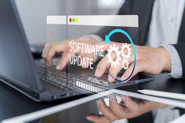 Photo man working and installing update process software updates or operating system upgrades to keep your device up