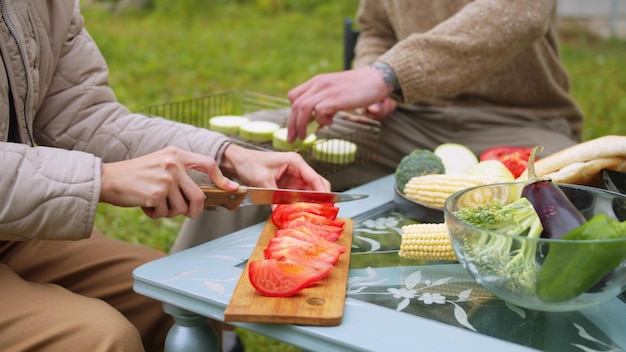 Midsection of woman holding food on table